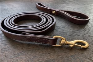 Full-grain leather dog leash 6ft — rolled leather, brass hardware, premium retail positioning